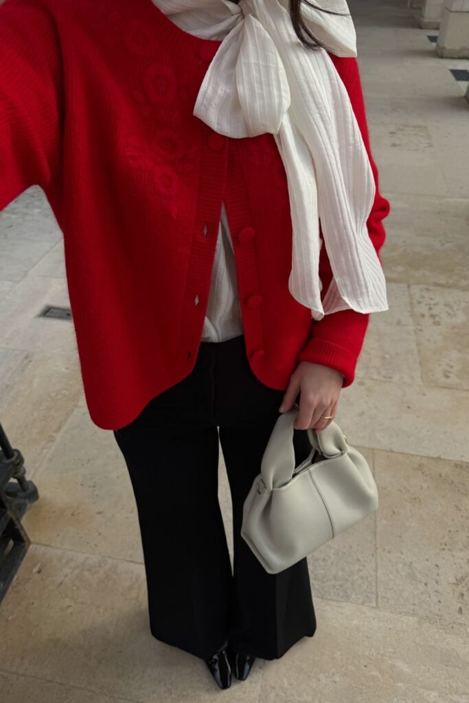 Red Embroidered Cardigan + White Ruffled Blouse + Black Flared Trousers