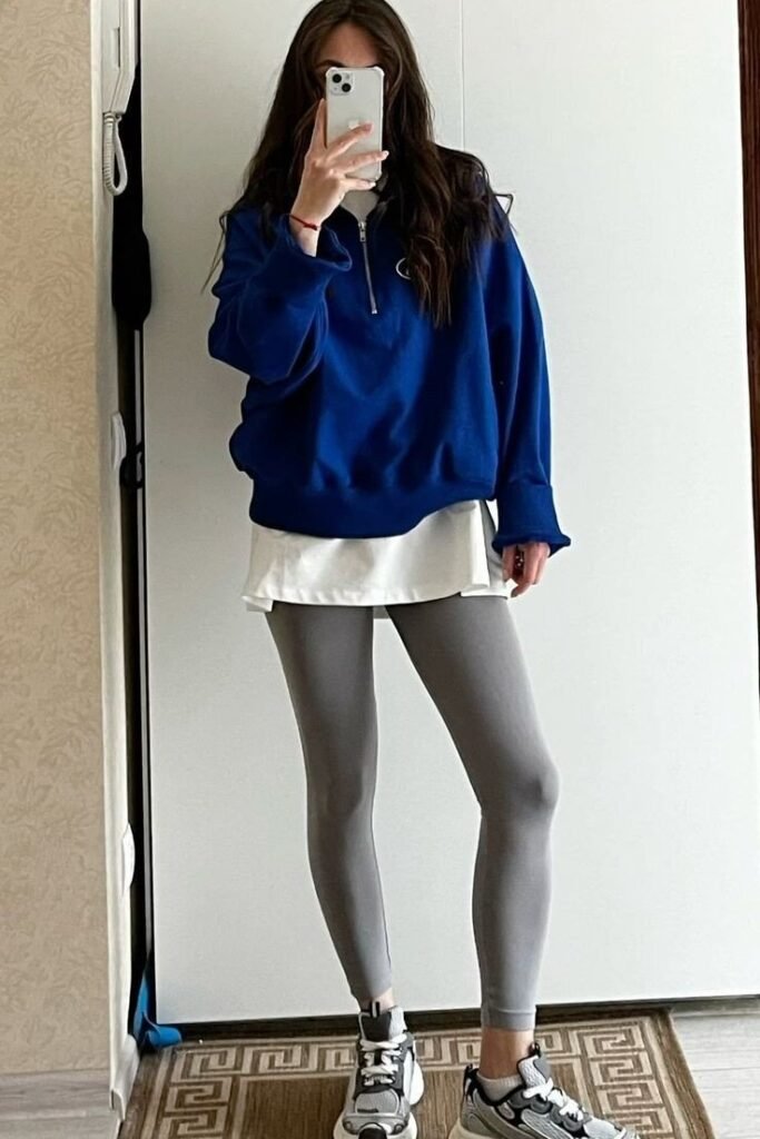 Royal Blue Quarter-Zip Sweatshirt + White Layered Tee + Grey Leggings + Multi-Color Sneakers
