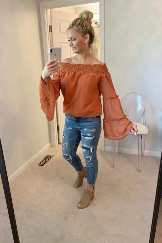 Rust Off the Shoulder Bell Sleeve Top + Distressed Skinny Jeans + Tan Perforated Booties