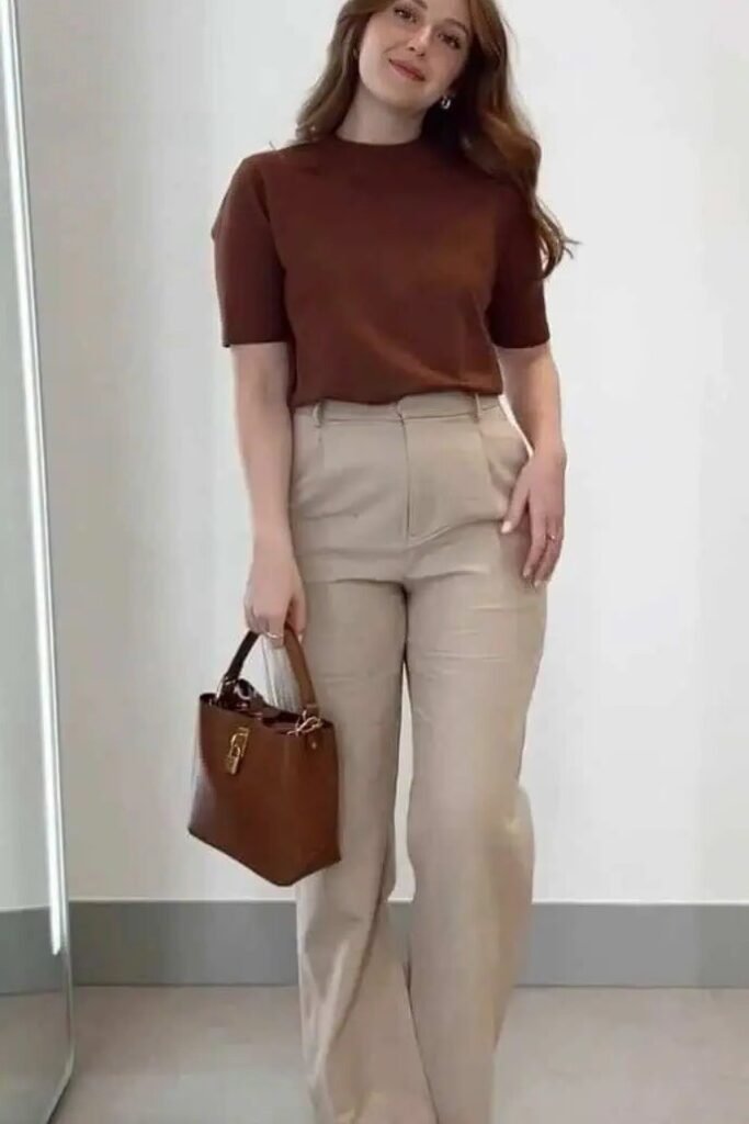 Short-sleeve Rust Brown Knit Top + Beige High-waisted Trousers + Brown Leather Handbag