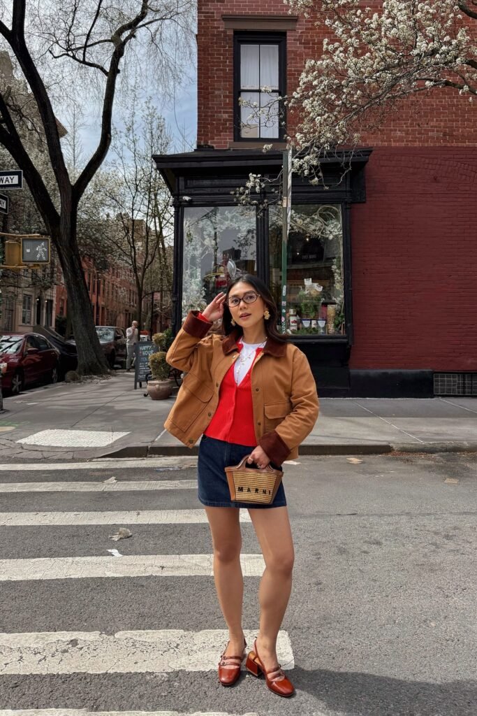 Tan Utility Jacket with Corduroy Collar + Red Button-Up Cardigan + Denim Mini Skirt + Brown Mary Jane Heels