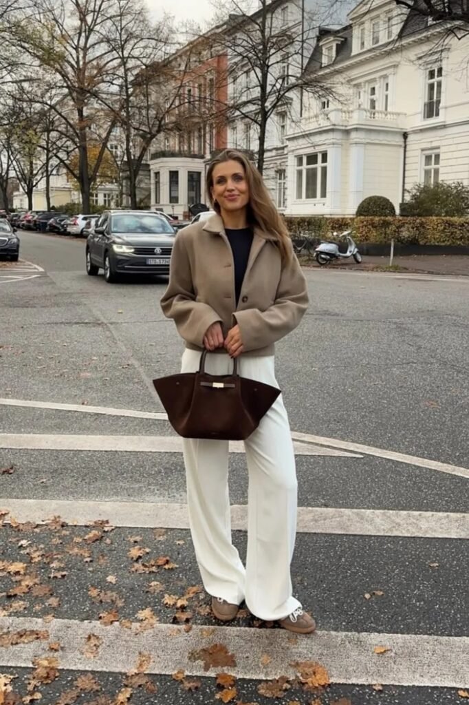 Tan Wool Jacket + White Wide-Leg Trousers + Brown Suede Sneakers