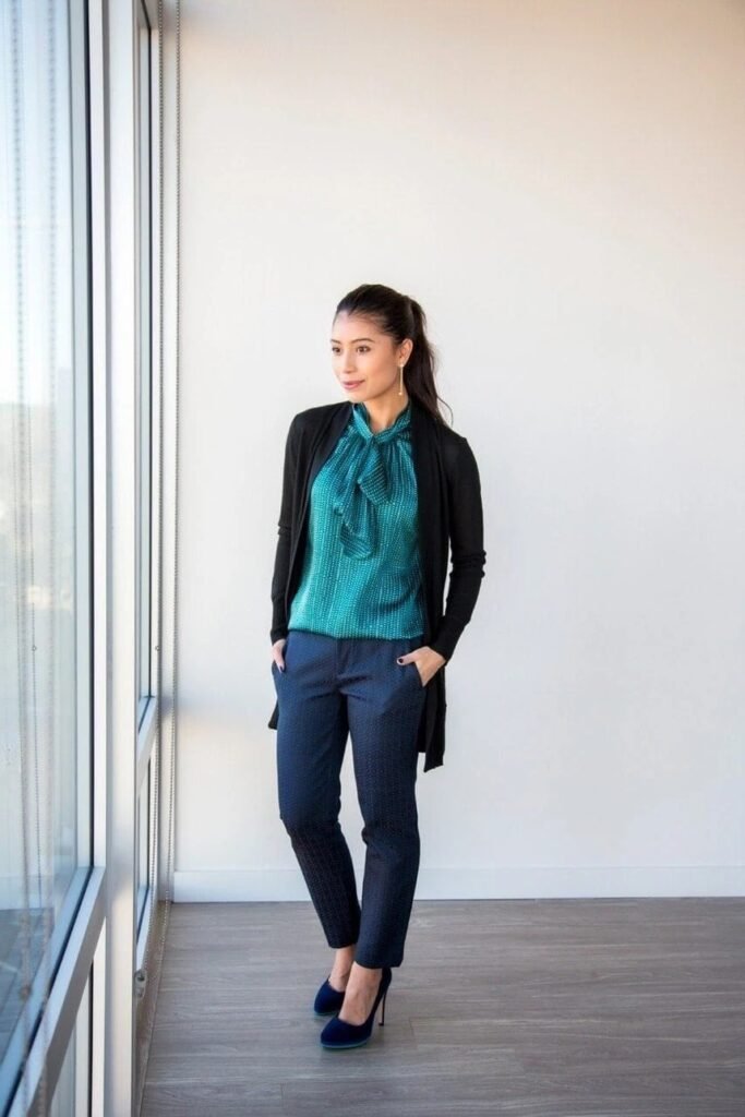 Teal Bow-Tie Satin Blouse + Black Long Cardigan + Navy Patterned Trousers + Navy Suede Pumps