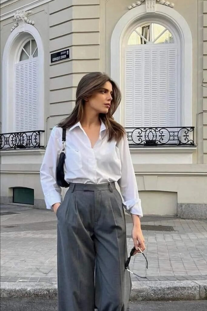White Button Down Shirt + Dark Grey High Waisted Wide Leg Trousers + Black Shoulder Bag