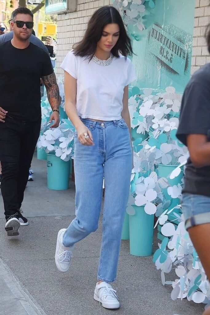 White Crop Top + High-Waisted Light Wash Jeans + White Sneakers
