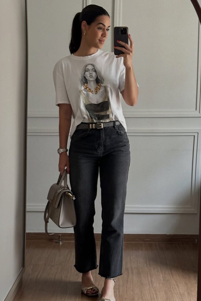 White Graphic T-Shirt + Dark Grey Straight-Leg Jeans + Gold Strappy Sandals
