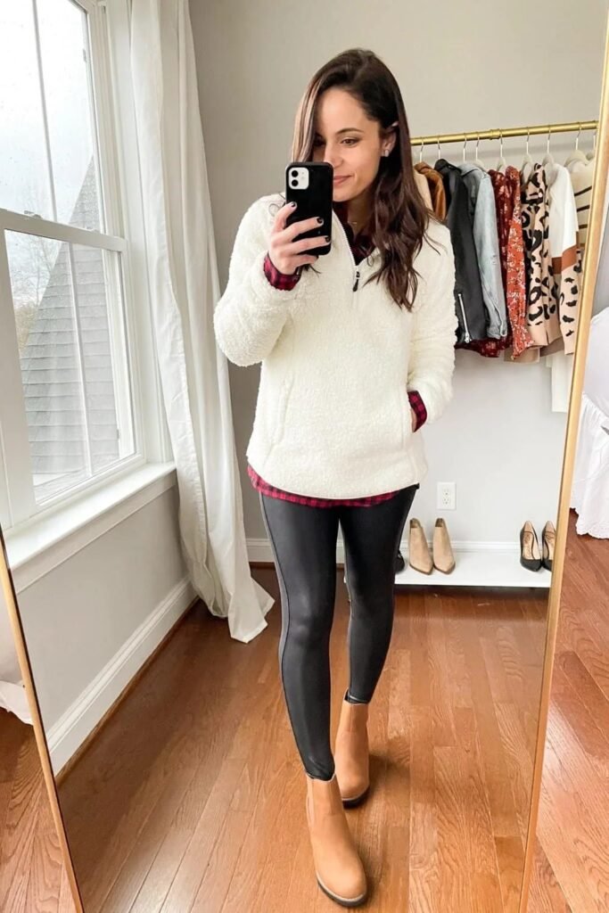 White Sherpa Quarter Zip Pullover + Red Plaid Shirt + Black Faux Leather Leggings + Tan Chelsea Boots