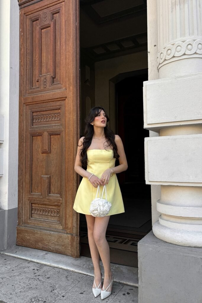 Yellow Strapless Mini Dress + White Rosette Handbag + White Slingback Heels