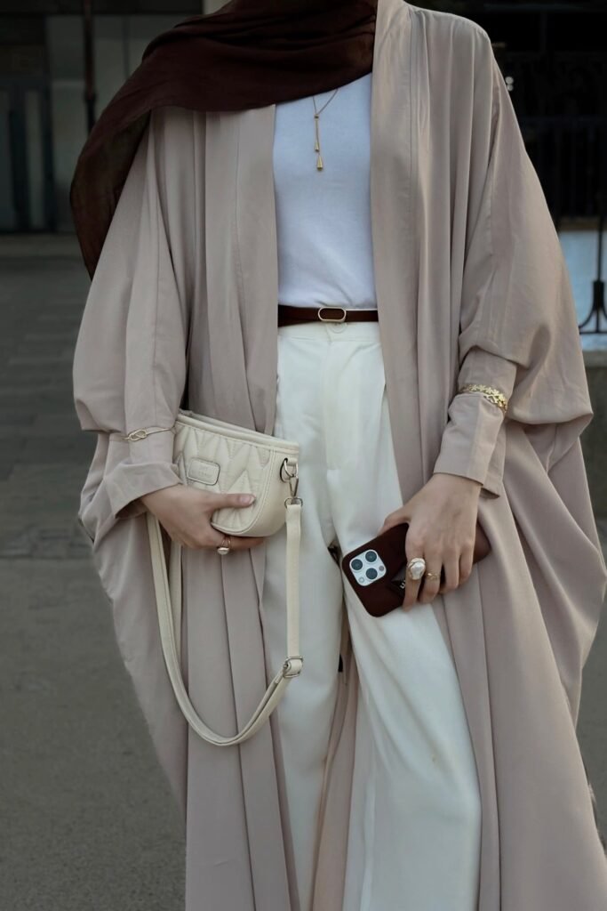 Beige Abaya + White Top & Trousers + Cream Quilted Handbag