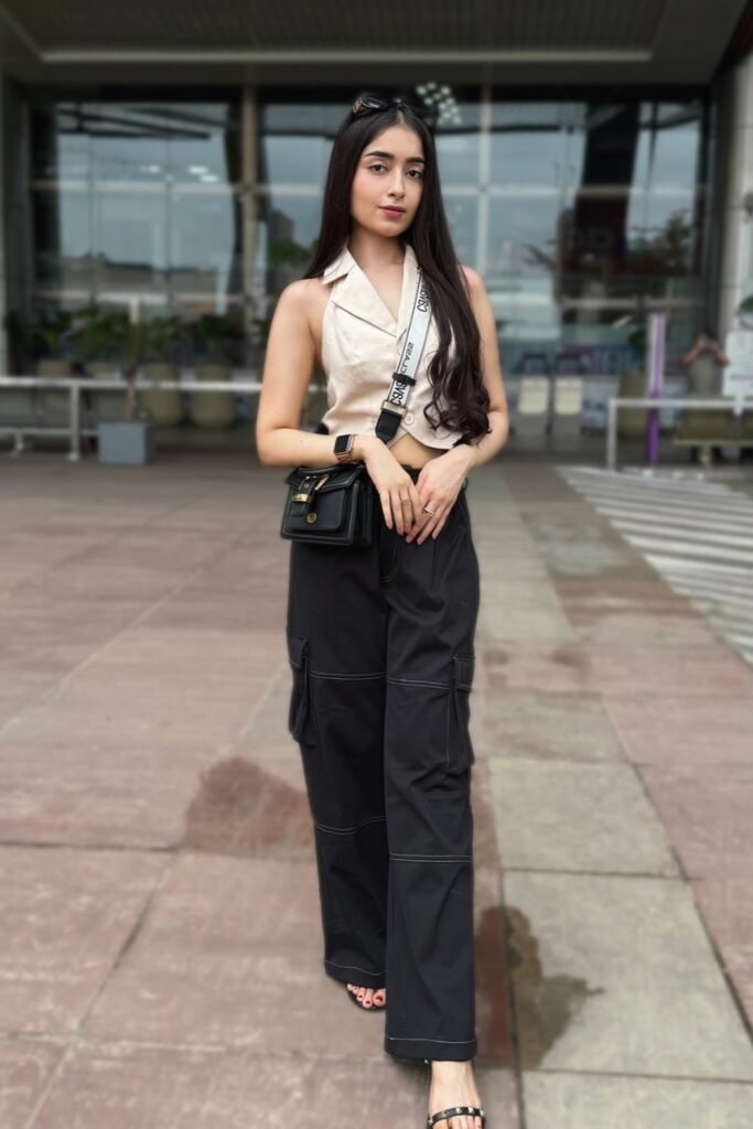 Beige Halter Vest + Black Cargo Pants + Black Studded Sandals