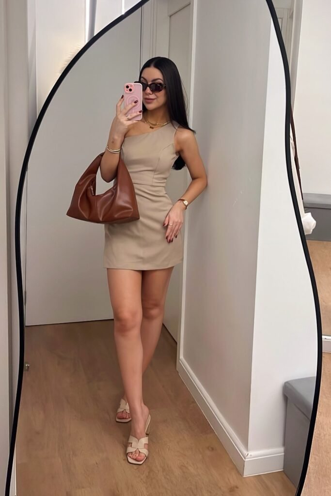 Beige One-Shoulder Mini Dress + Brown Slouchy Shoulder Bag + Beige Strappy Heeled Sandals