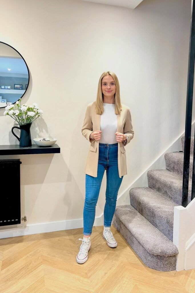 Beige Open Blazer + White Ribbed Top + Blue Skinny Jeans + White High Top Sneakers