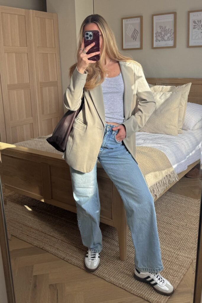 Beige Oversized Blazer + Light Wash Jeans + White and Black Sneakers