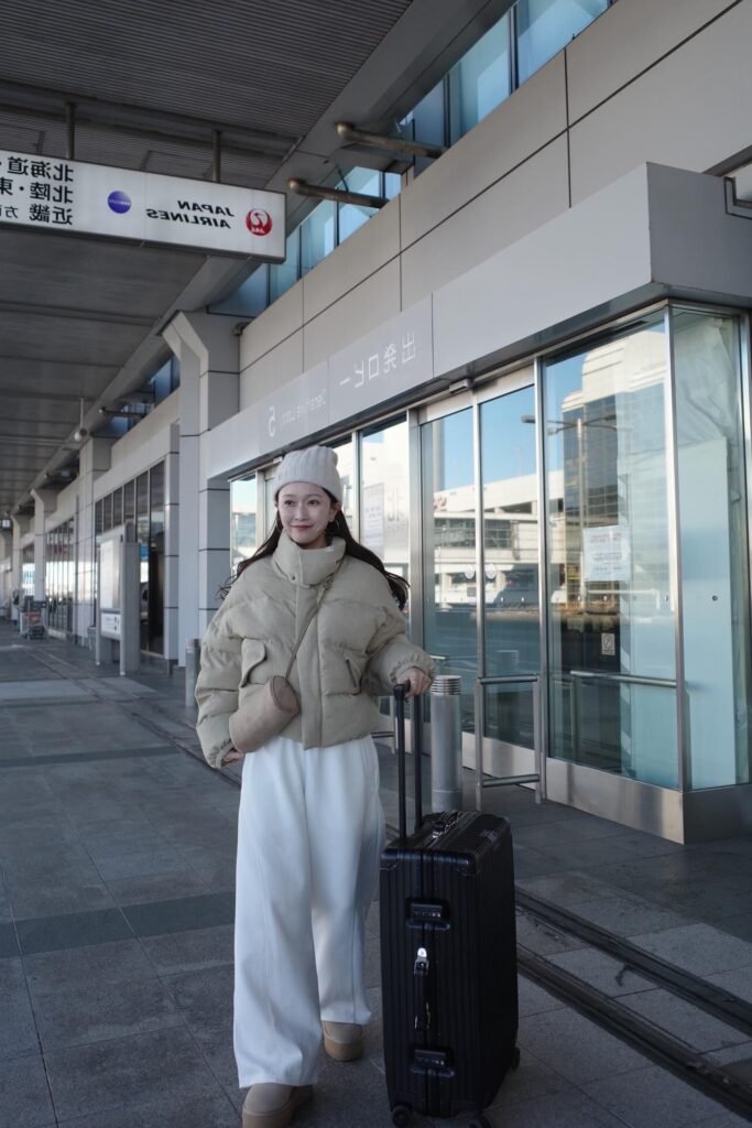 Beige Puffer Jacket + White Wide-Leg Trousers + Tan Platform Boots