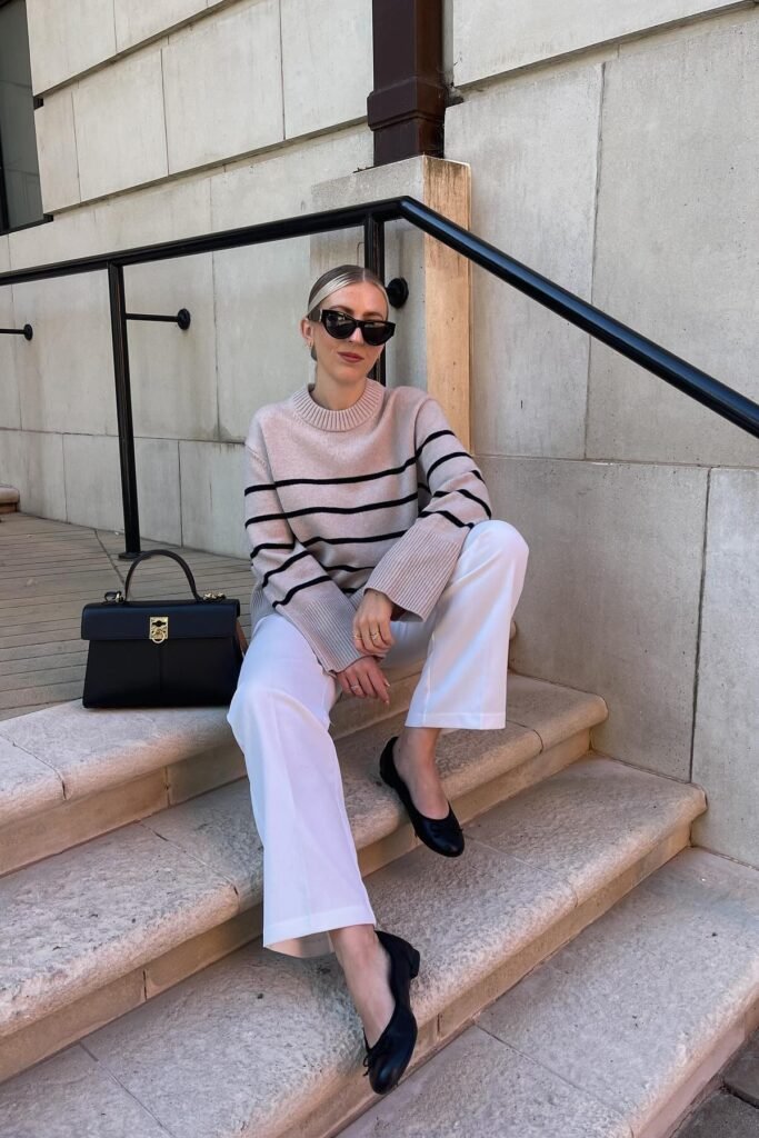 Beige Striped Crewneck Sweater + White Wide-Leg Trousers + Black Ballet Flats