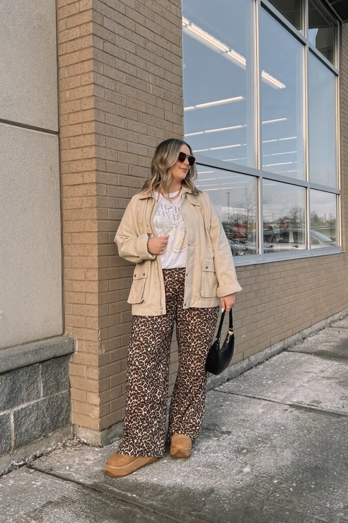 Beige Utility Jacket + Graphic T-Shirt + Leopard Print Wide-Leg Pants + Tan Platform Boots