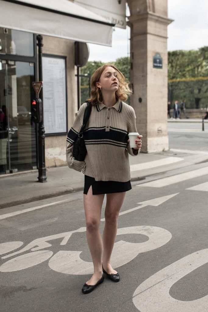 Beige and Navy Striped Polo Sweater + Black Mini Skirt + Black Classic Ballet Flats