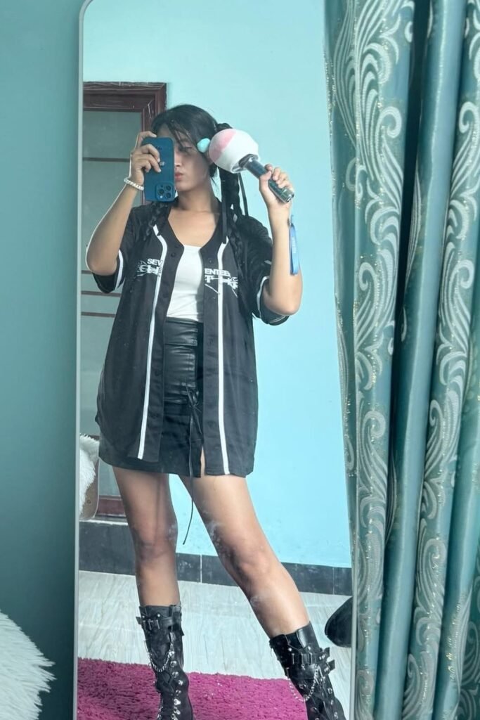 Black Baseball Jersey + White Top + Black Leather Mini Skirt + Black Buckled Combat Boots