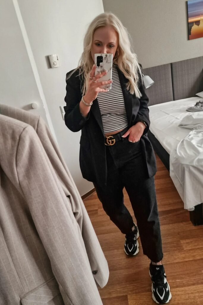Black Blazer + Striped Mock Neck Top + Black Jeans + Black and White Chunky Sneakers