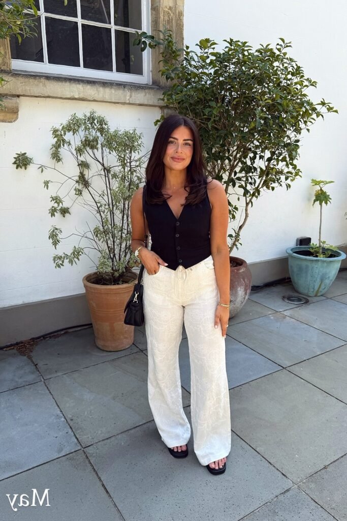 Black Button Down Waistcoat + White Patterned Wide Leg Trousers + Black Strappy Sandals