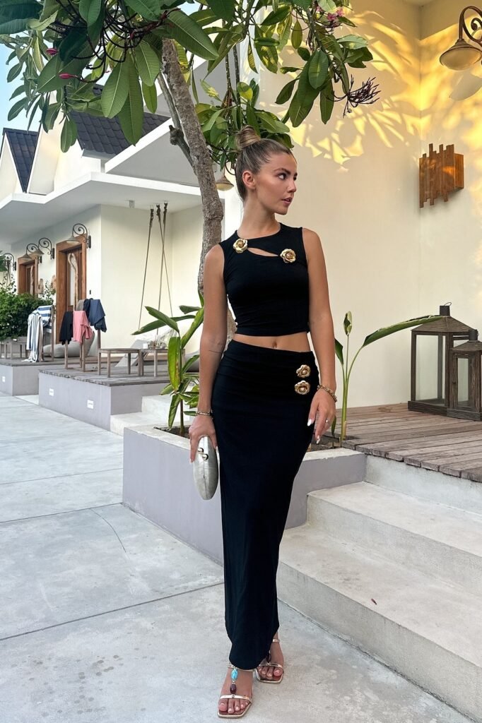 Black Cut-Out Crop Top with Gold Rosettes + Matching Black Maxi Skirt + Silver Hard-Shell Clutch