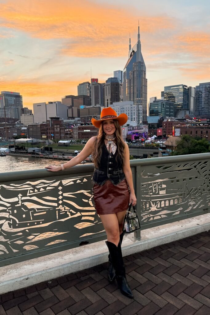 Black Denim Vest + Brown Leather Mini Skirt + Black Western Boots