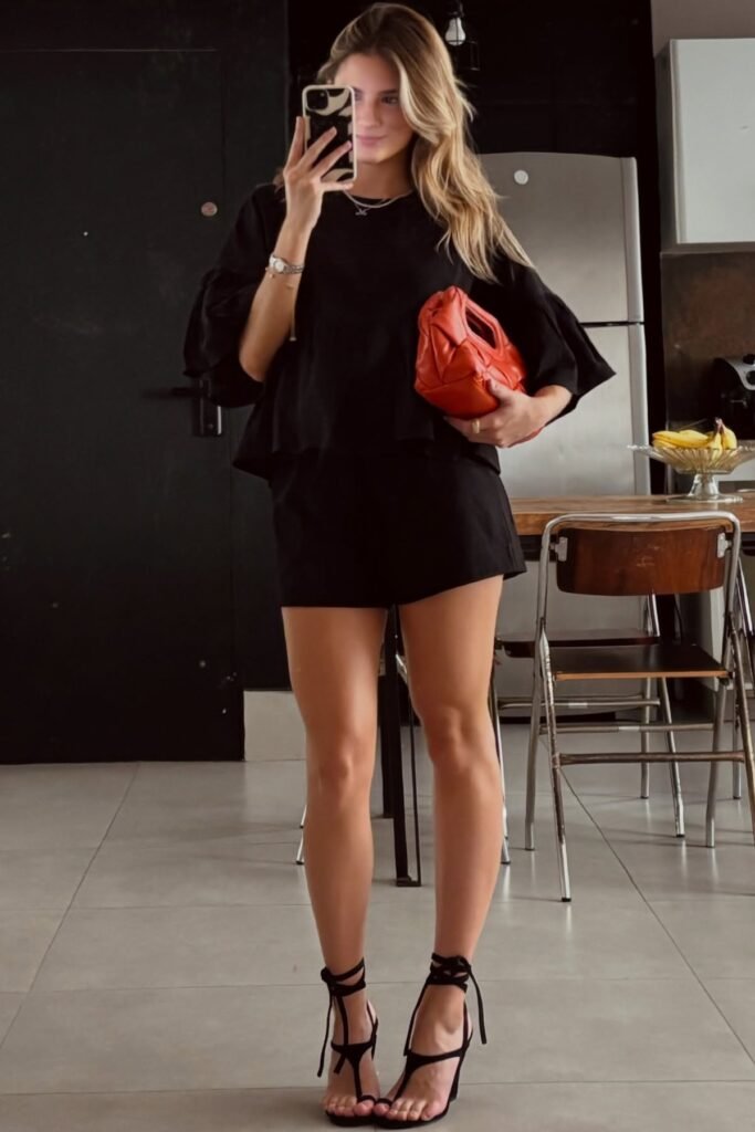 Black Flutter-Sleeve Blouse + Black Mini Shorts + Black Strappy Sandal Heels