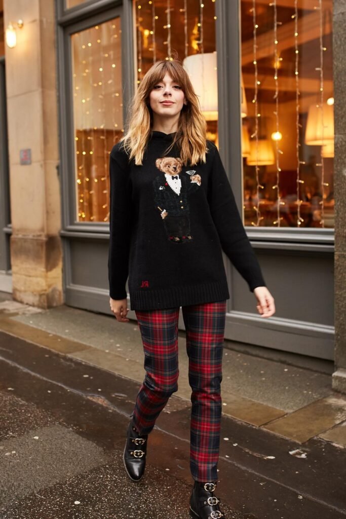 Black Graphic Bear Sweater + Red Plaid Slim Trousers + Black Buckled Boots