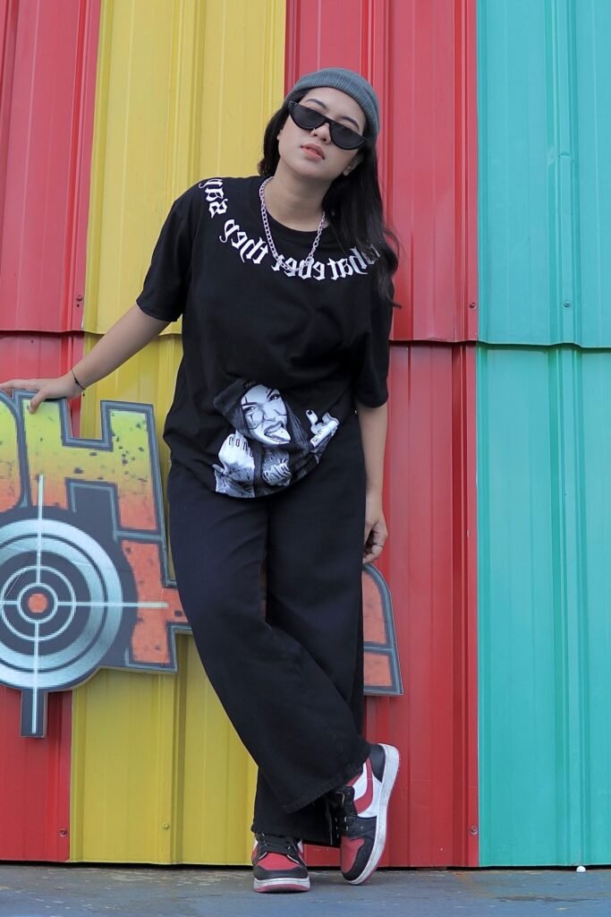 Black Graphic T-Shirt + Black Wide-Leg Pants + Red Sneakers