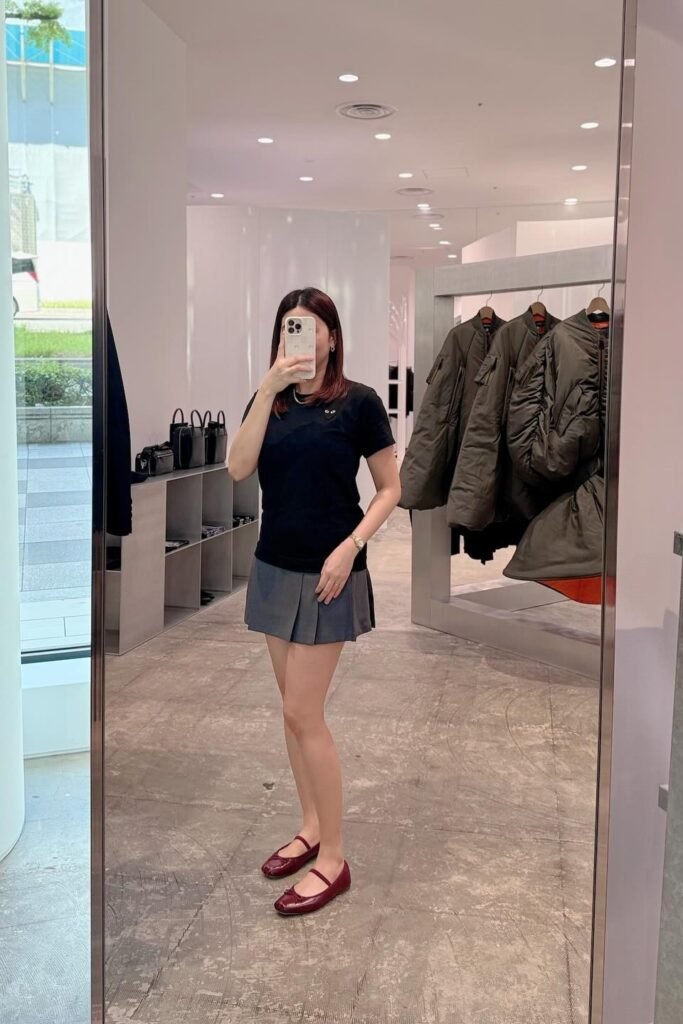 Black Graphic T-Shirt + Grey Pleated Mini Skirt + Burgundy Patent Mary Janes