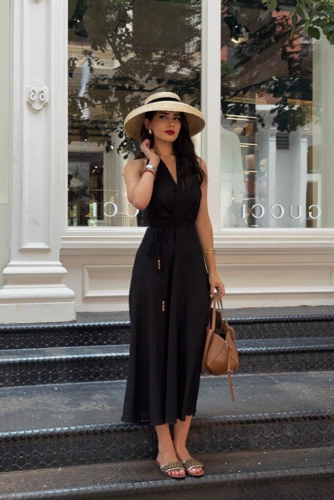 Black Halter Midi Dress + Straw Sun Hat + Tan Leather Handbag