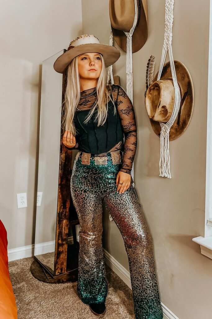 Black Lace Long-Sleeve Top + Black Corset Bodice + Green Sequin Flared Trousers + Tan Cowboy Hat