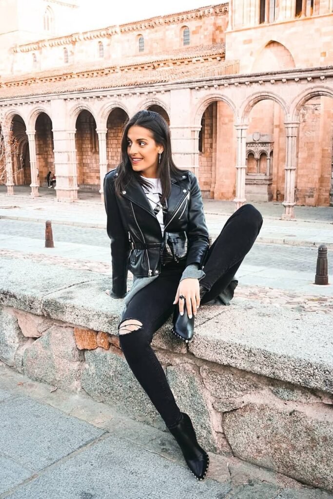Black Leather Moto Jacket + White Graphic Tee + Black Distressed Skinny Jeans + Black Pointed-Toe Ankle Boots