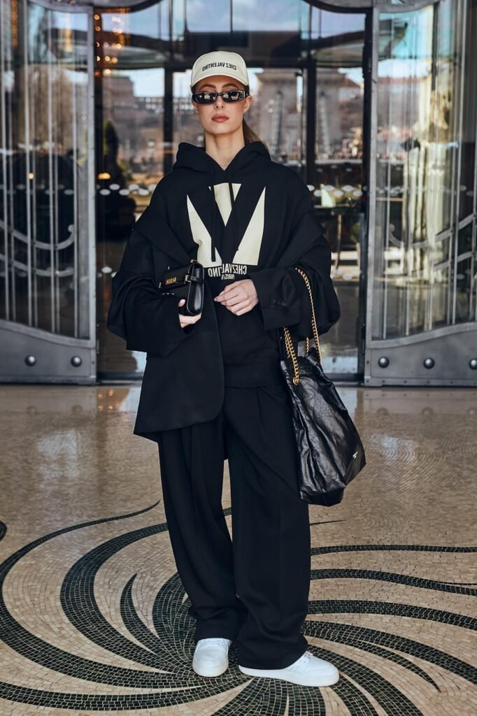 Black Oversized Graphic Hoodie + Black Wide-Leg Trousers + White Sneakers