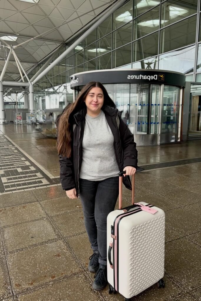 Black Parka Jacket + Grey Crewneck Sweater + Dark Grey Skinny Jeans