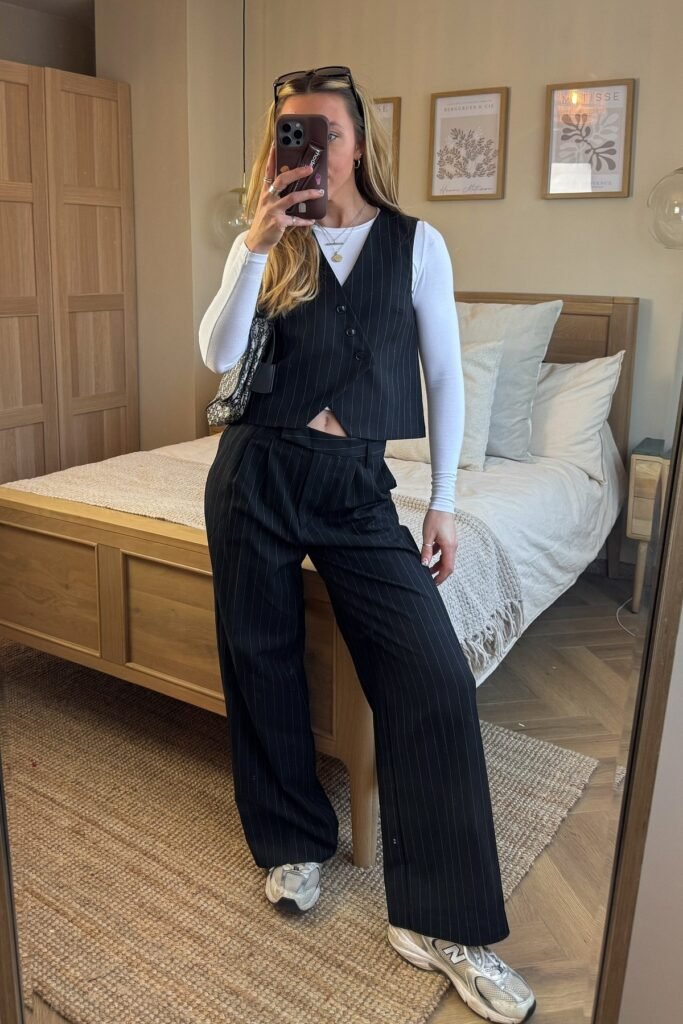 Black Pinstripe Vest and Trousers Set + White Long-Sleeve Top + Silver Sneakers