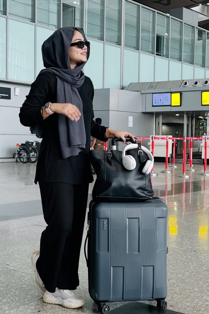 Black Ribbed Tunic + Black Trousers + Grey Hijab + White Platform Sneakers