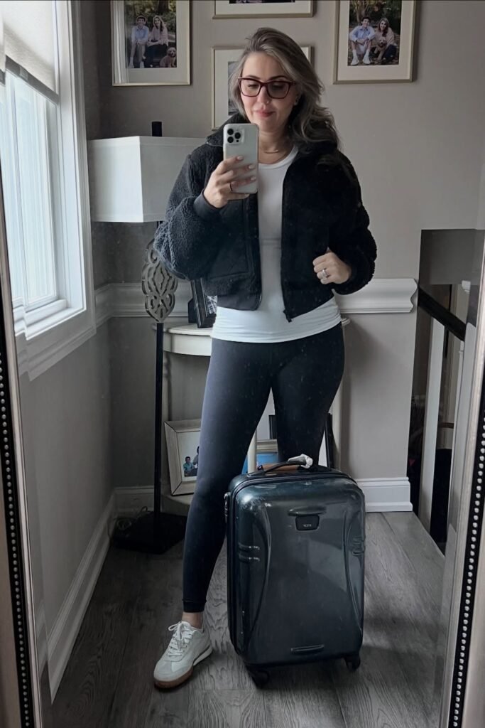 Black Sherpa Jacket + White Long-Sleeve Tee + Black Leggings + White Sneakers