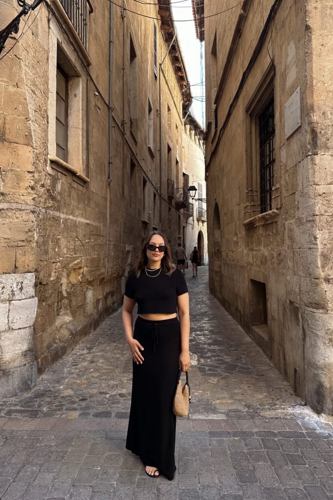Black Short-Sleeve Crop Top + Black Maxi Skirt + Straw Mini Bag + Black Sandals