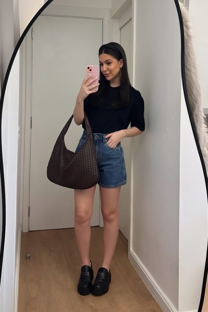 Black Short-Sleeve T-Shirt + Dark Wash Denim Shorts + Black Chunky Loafers + Dark Brown Woven Hobo Bag