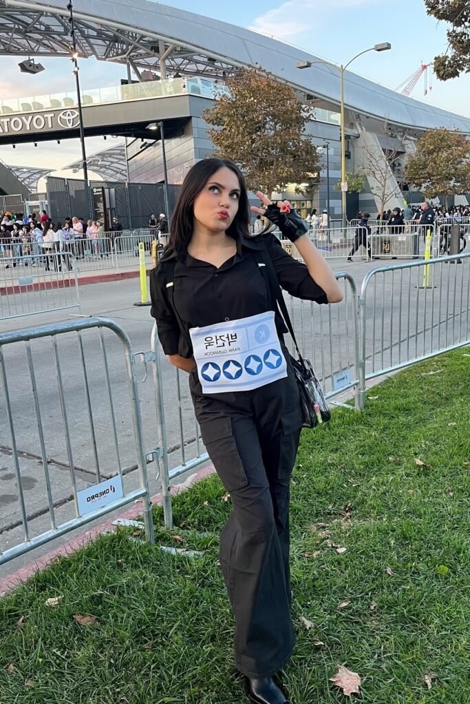 Black Short-Sleeved Button-Down + Black Cargo Flare Pants + Black Boots