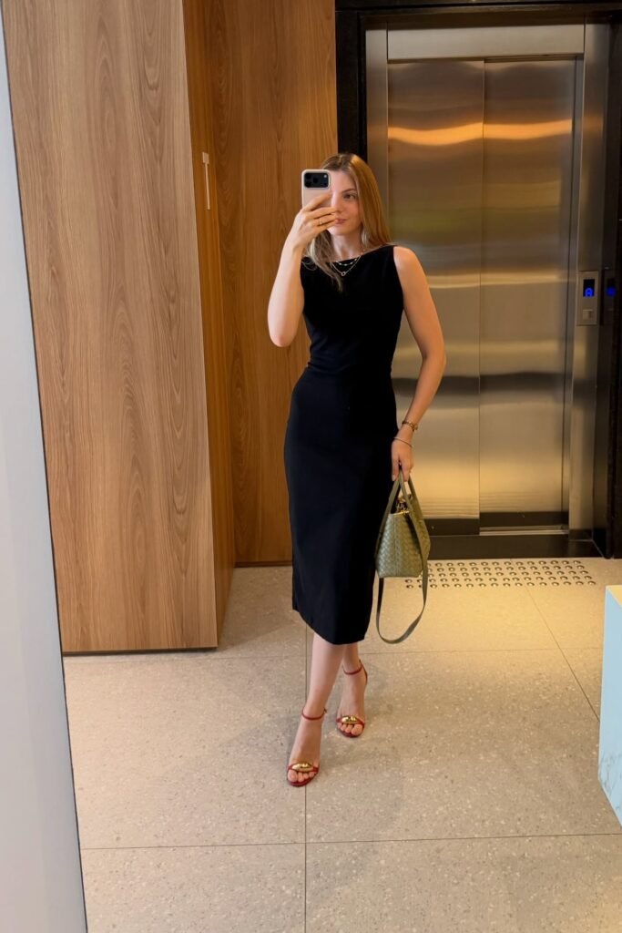 Black Sleeveless Column Dress + Olive Green Handbag + Red Strappy Sandals