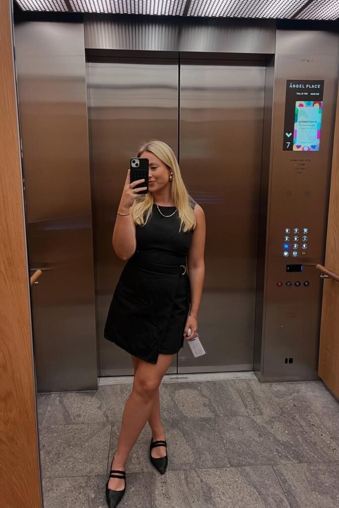 Black Sleeveless Mini Wrap Dress + Gold Chain Necklace + Black Double-Strap Pointed Flats