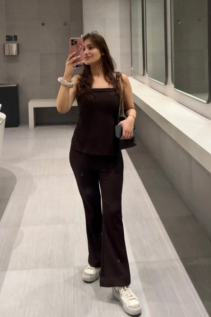 Black Square-Neck Tank Top + Black Flared Trousers + White Nike Sneakers