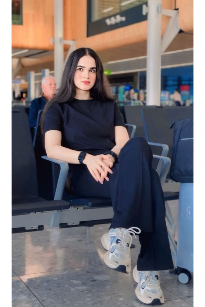 Black T-Shirt + Black Wide-Leg Trousers + Chunky Grey and White Sneakers