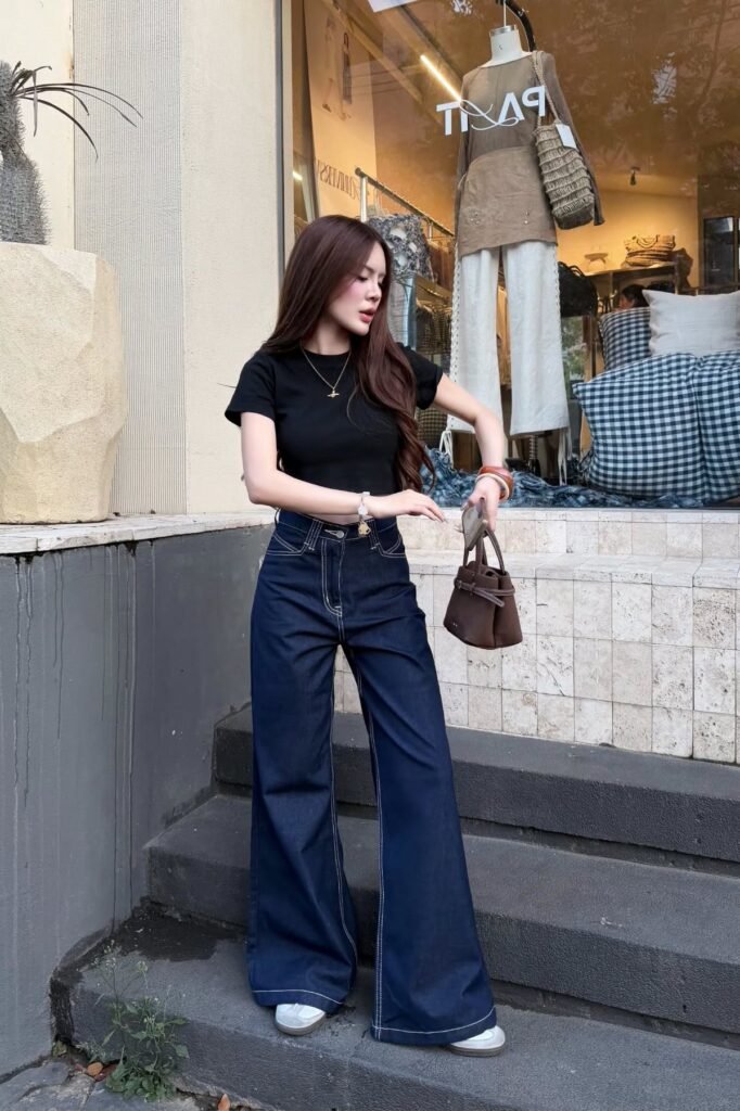 Black T Shirt + Dark Indigo Wide Leg Jeans + White Sneakers