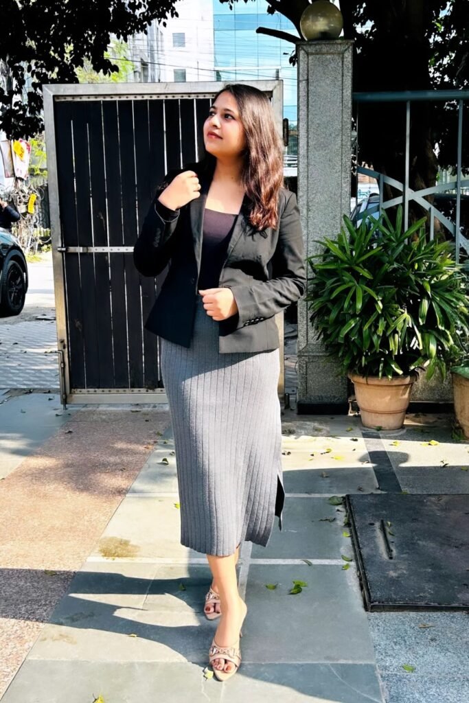 Black Tailored Blazer + Black Top + Grey Ribbed Midi Skirt + Beige Chain Mules