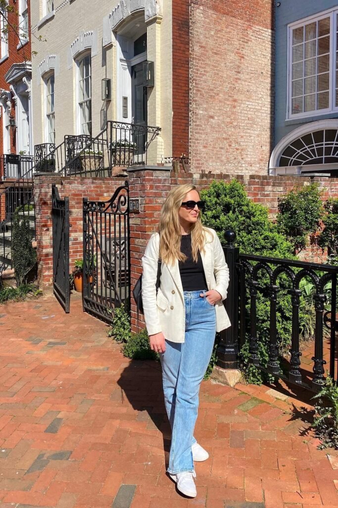 Black Top + White Double Breasted Blazer + Light Wash Straight Leg Jeans + White Sneakers