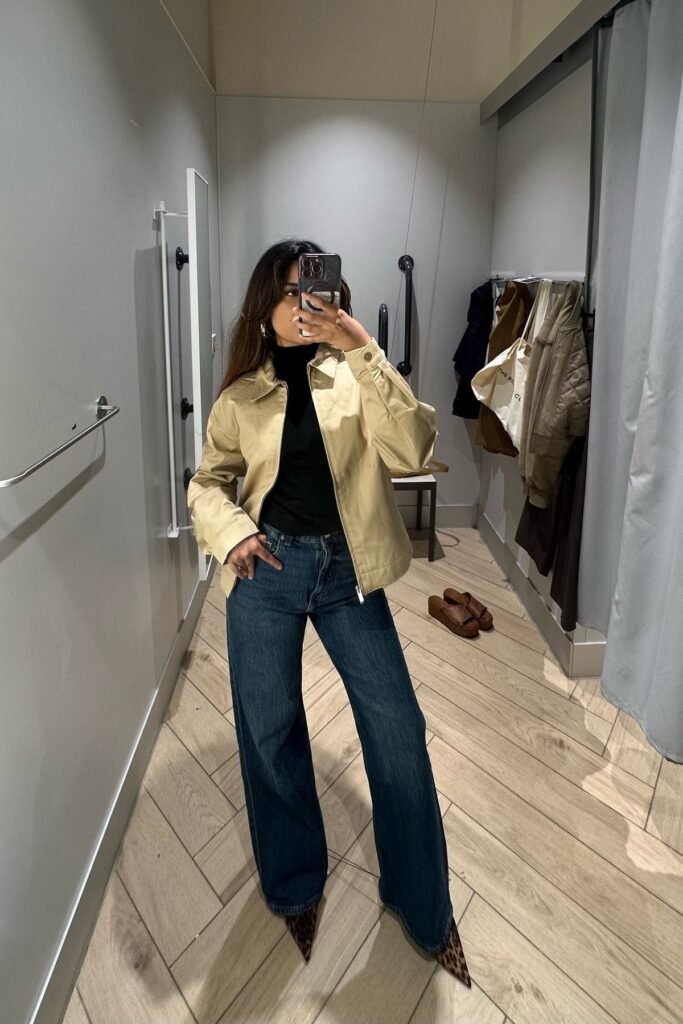 Black Turtleneck + Tan Zip-Up Utility Jacket + Dark Wash Wide-Leg Jeans + Leopard Print Pointed Heels