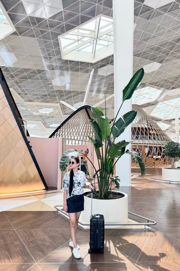 Black & White Graphic T-Shirt + Dark Denim Mini Skirt + White Sneakers
